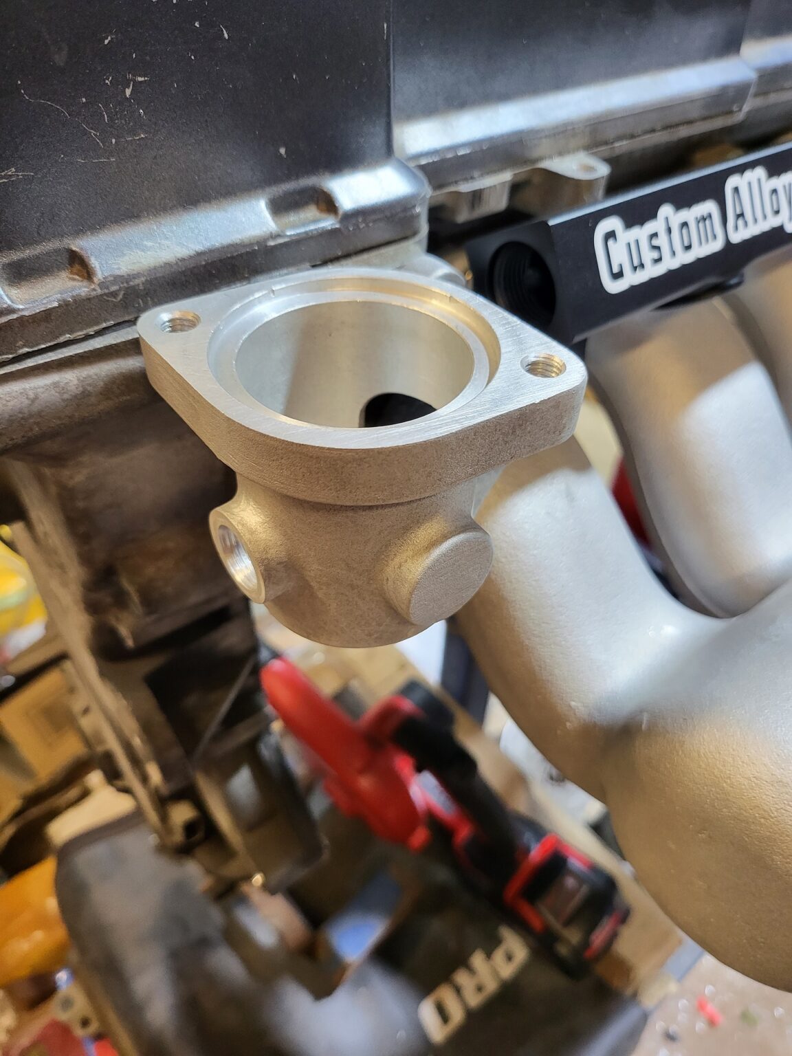 Barra cast lower thermostat housing Custom Alloy Welding