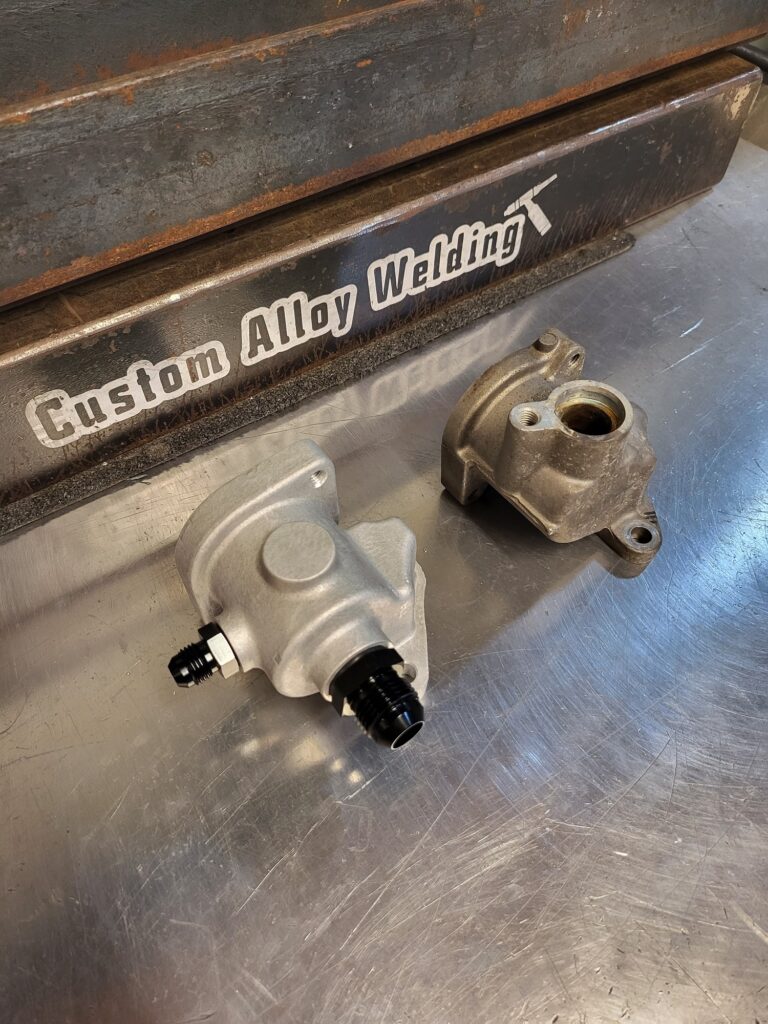 Barra cast lower thermostat housing