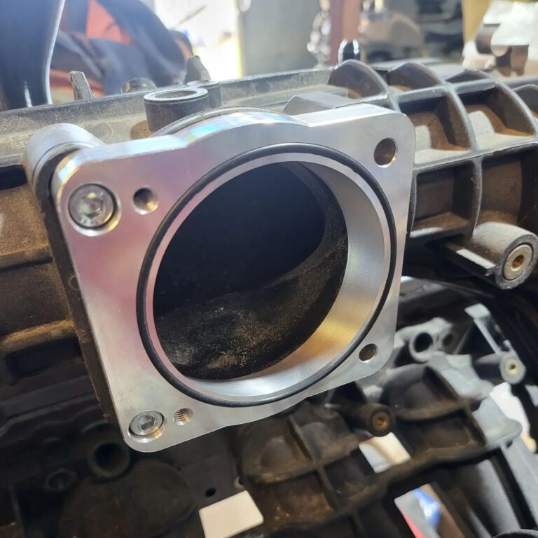 Barra BA throttle body to FG intake manifolds