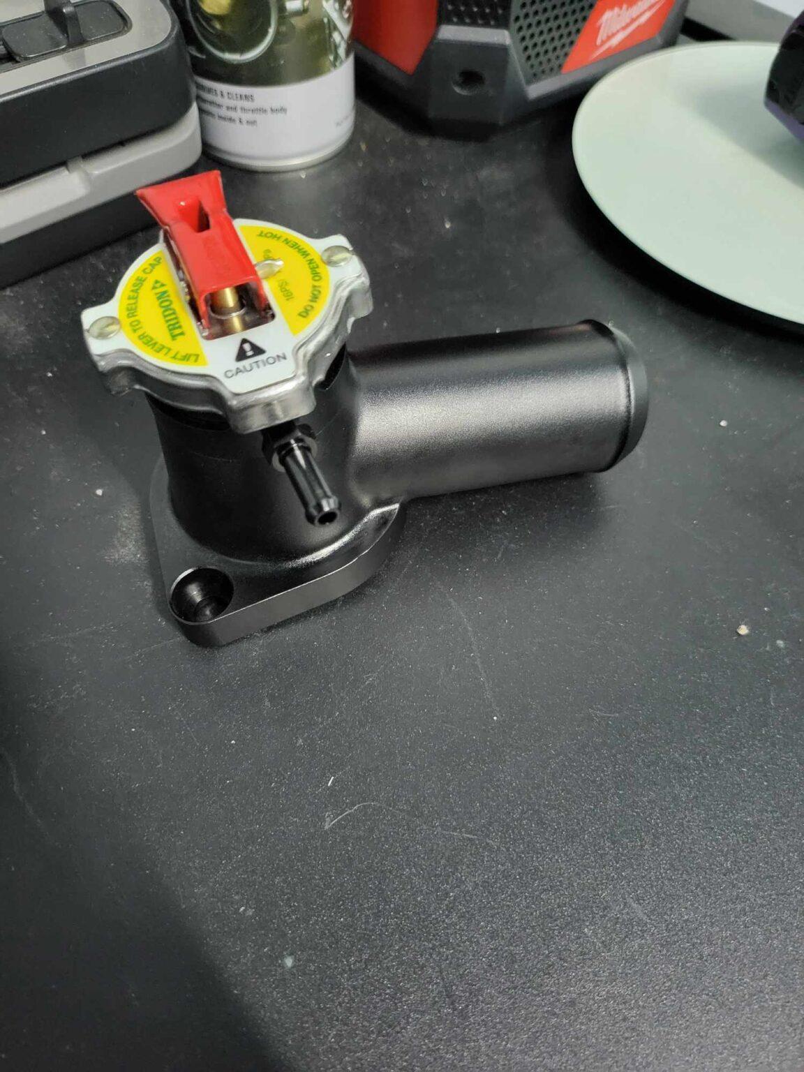 Barra and sohc billet thermostat housing with cap Custom Alloy Welding